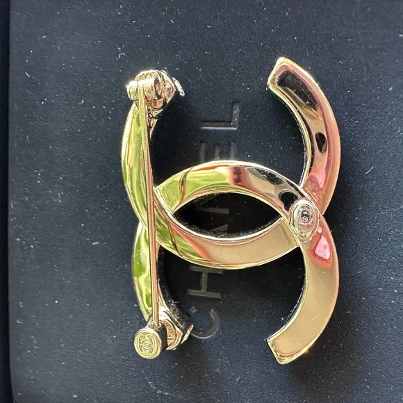 Chanel Silver Crystal Logo Brooch